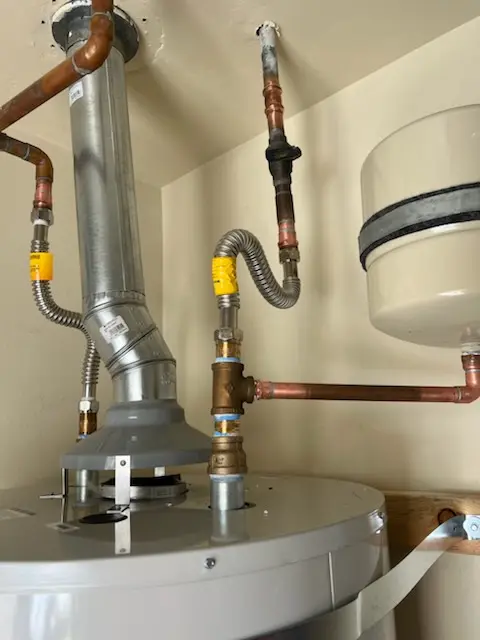 Water heater installation and plumbing repair in Kent Furnace